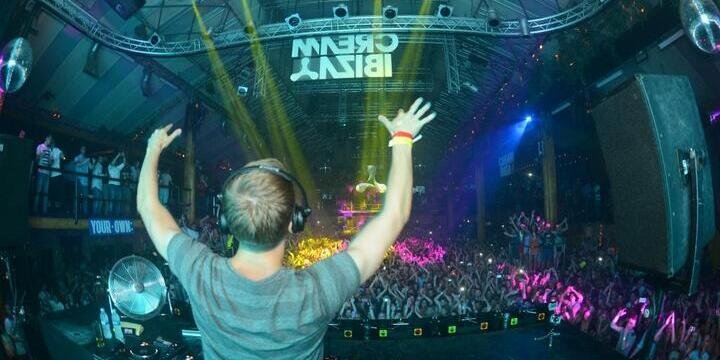 man in front of crowd as a dj