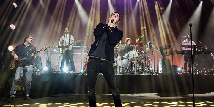 Maroon 5 Malahide Castle Concert Single Ticket to Dublin City picby Justin Higuchi CC man singing into mic with band playing behind him