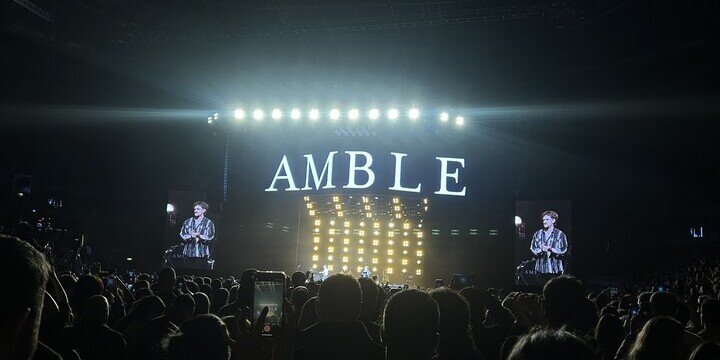 the word AMBLE over a stage