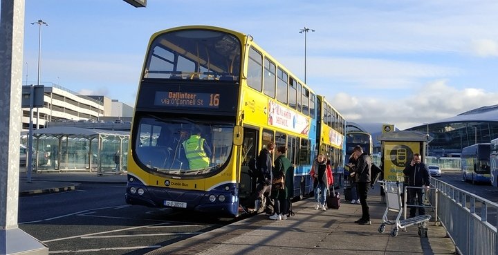 people boarding bus at dublin airport