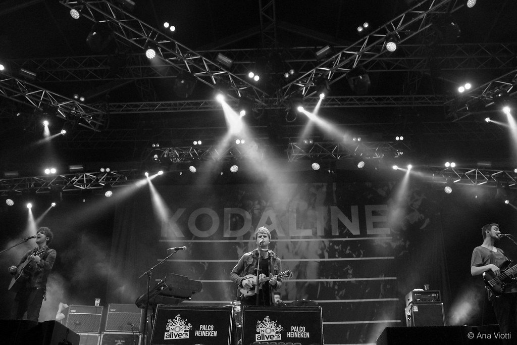 Kodaline pic by sidestagecollective black and white image with kodaline in the background on a stage