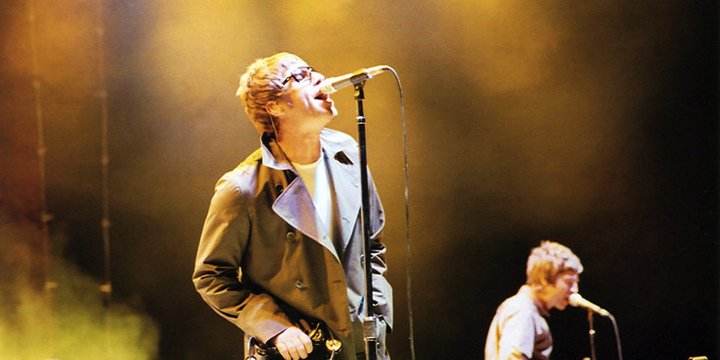 man singing into mic